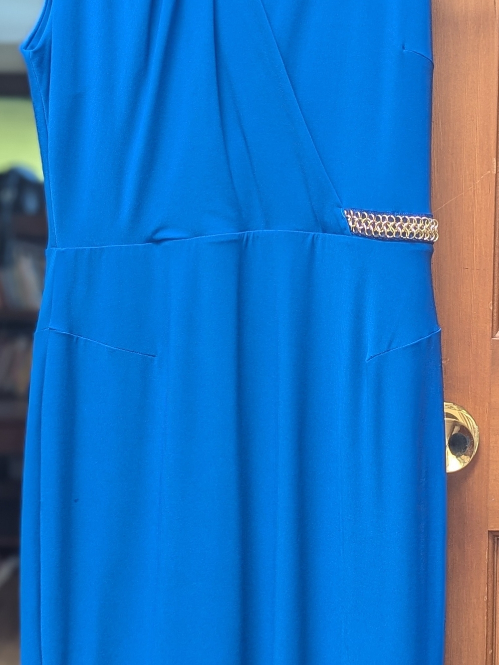 Elegant Blue Sleeveless Dress with Chain Accent